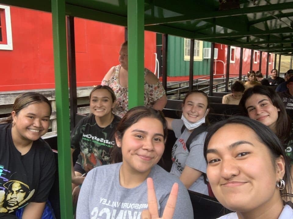 Enjoying the rides with advisor, Ms. Miles.