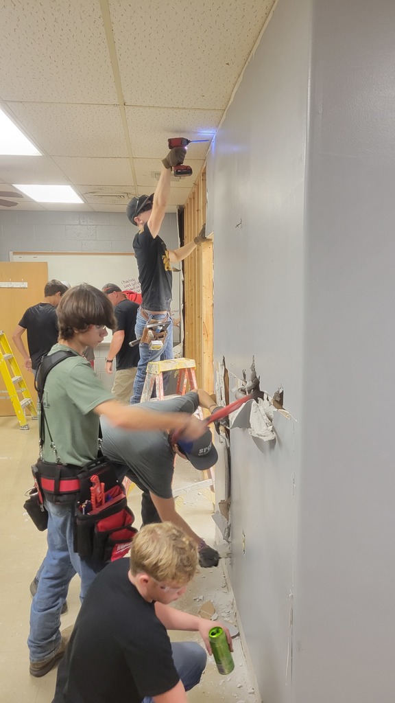 Saline County Career Center Building Trades Class demoing a room